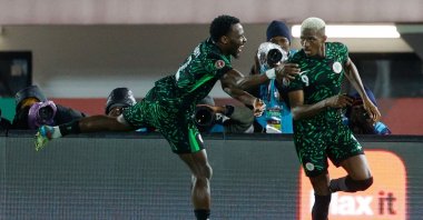Nigeria's Victor Osimhen (R) celebrates his goal with Bright Osayi-Samuel during an AFCON match against Tunisia at Fez Stadium in Fez, Morocco, Dec. 27, 2025. (AFP Photo)