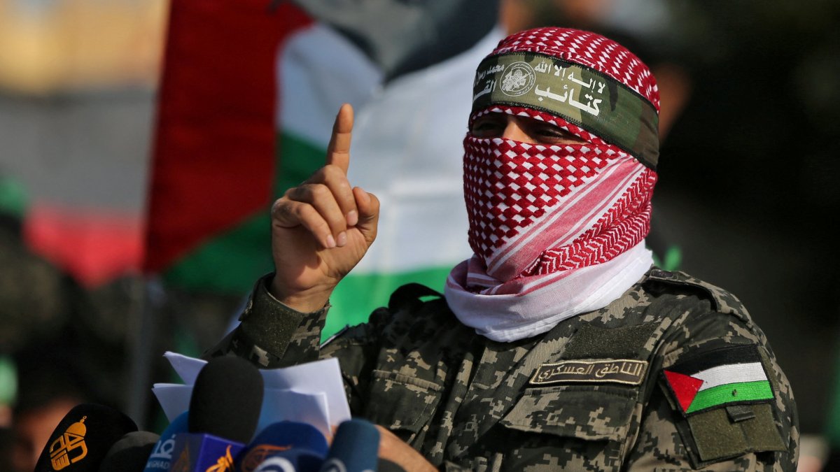 Abu Ubaida, the spokesperson of Hamas' al-Qassam Brigades, gestures as he speaks during an anti-Israel military show in the southern Gaza Strip, Nov. 11, 2019. (Reuters Photo)