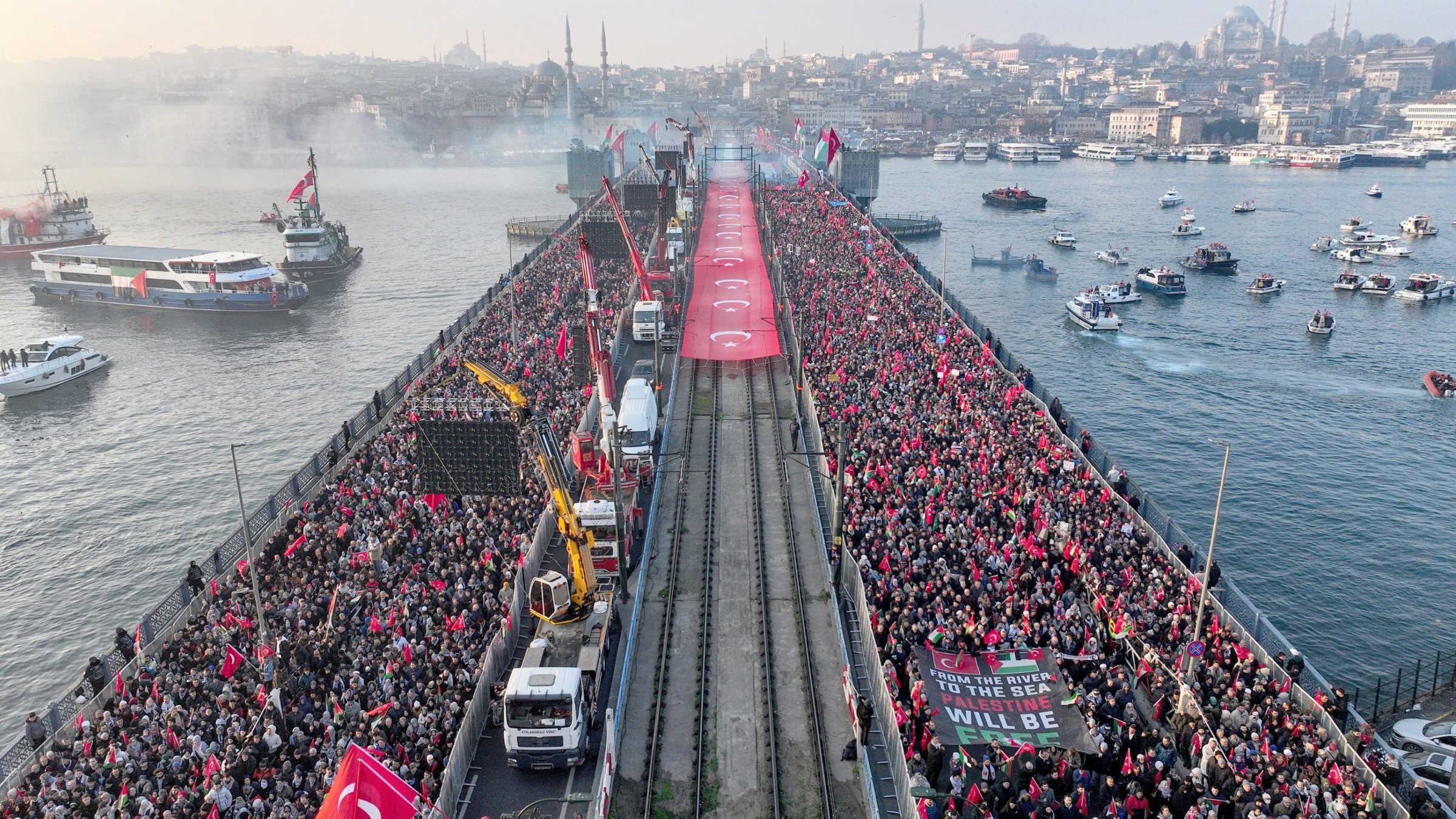 An aerial view of the crowd gathered for the rally on Galata Bridge, in Istanbul, Türkiye, Jan. 1, 2025. (AA Photo)
