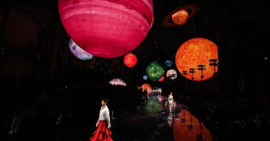 A model presents a creation by Chanel for the Women's Ready-to-Wear Spring/Summer 2026 collection as part of Paris Fashion Week, at the Grand Palais, Paris, France, Oct. 6, 2025. (AFP Photo)