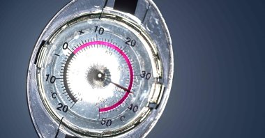 This photograph shows a thermometer indicating a temperature of 36 degrees Celsius, Rennes, western France, June 11, 2025. (AFP Photo)