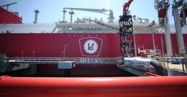 The logo of BOTAŞ is seen on Türkiye's first FSRU Ertuğrul Gazi at a port in Hatay, southeastern Türkiye, April 22, 2021. (AA Photo)