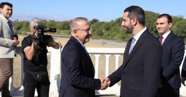 Ambassador Serdar Kılıç is seen (L) with Armenia's Special Envoy Ruben Rubinyan at the border, Iğdır, Türkiye, Sept.11, 2025 (DHA Photo)