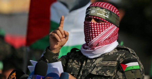 Abu Ubaida, the spokesperson of Hamas' al-Qassam Brigades, gestures as he speaks during an anti-Israel military show in the southern Gaza Strip, Nov. 11, 2019. (Reuters Photo)