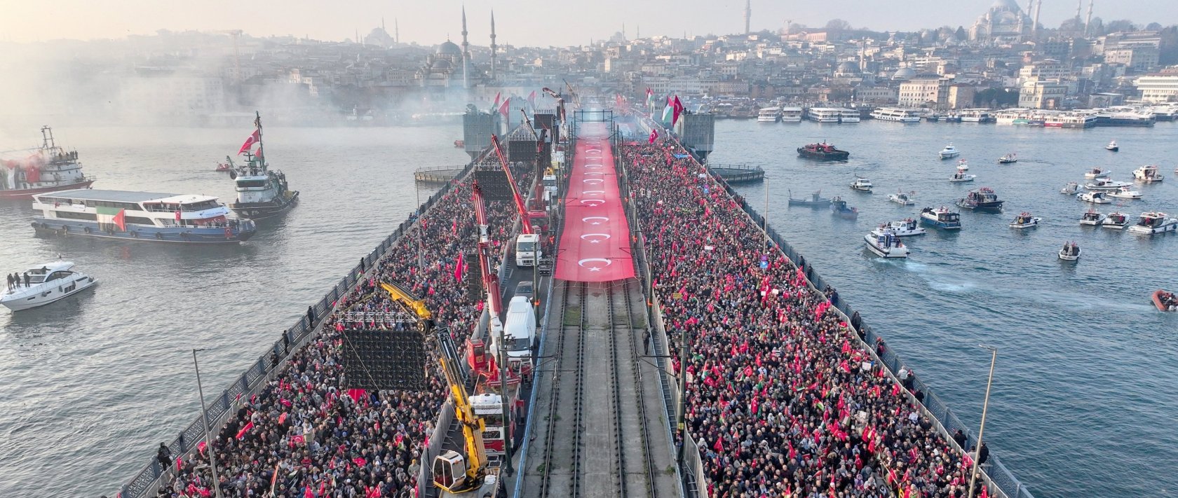An aerial view of the crowd gathered for the rally on Galata Bridge, in Istanbul, Türkiye, Jan. 1, 2025. (AA Photo)
