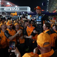 McLaren driver Lando Norris (C) is celebrated by team members for winning the 2025 Formula 1 drivers' world championship after the Formula One Abu Dhabi Grand Prix at the Yas Marina Circuit racetrack, Abu Dhabi, UAE, Dec. 7, 2025. (EPA Photo)