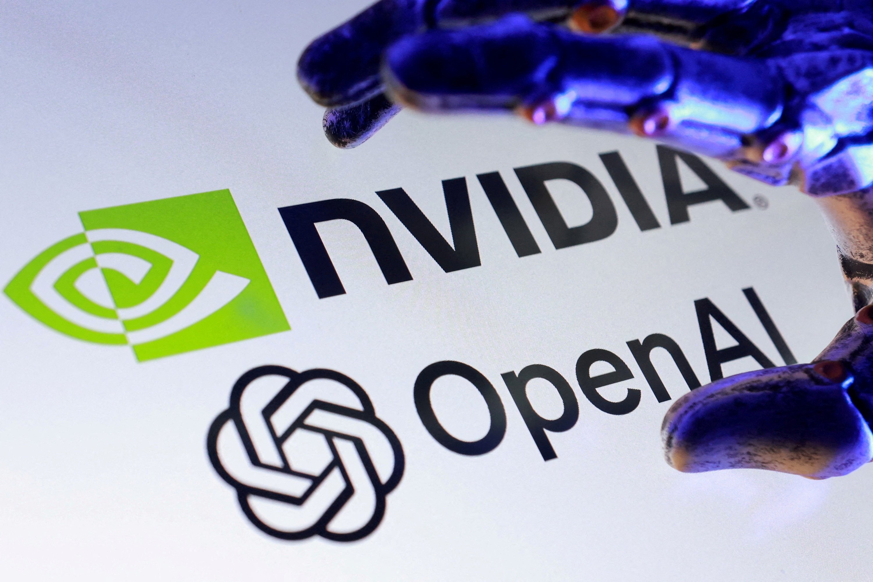 Nvidia and OpenAI logos are seen in this illustration taken on Sept. 22, 2025. (Reuters File Photo)