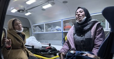 Mother and her children are transported inside an air ambulance en route from Jordan to Türkiye for urgent medical treatment, Ankara, Türkiye, Dec. 29, 2025. (AA Photo)