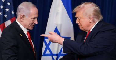 U.S. President Donald Trump points his finger toward Israeli Prime Minister Benjamin Netanyahu as they shake hands during a news conference in Palm Beach, Florida, U.S., Dec. 29, 2025. (Reuters Photo)