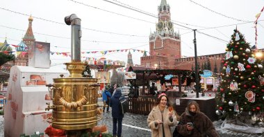 People visit the New Year and Christmas market in Red Square in Moscow, Russia, Dec. 16, 2025. (Reuters Photo)