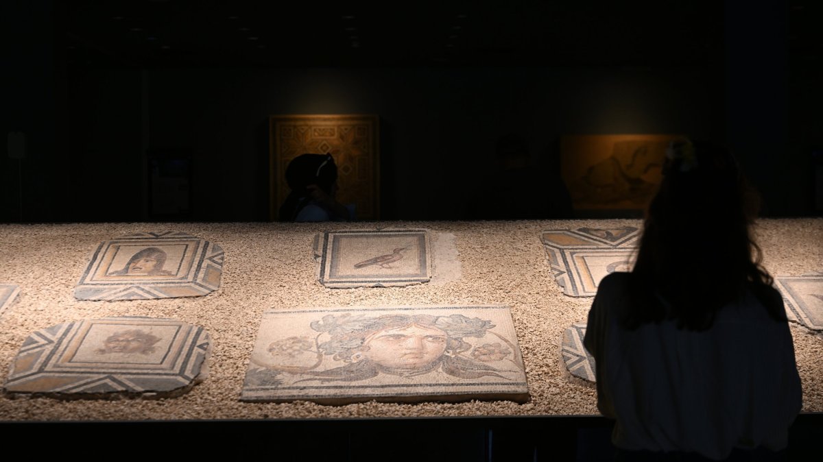 Visitors explore the mosaics at the Zeugma Mosaic Museum, Gaziantep, southeastern Türkiye, Aug. 31, 2025. (AA Photo)