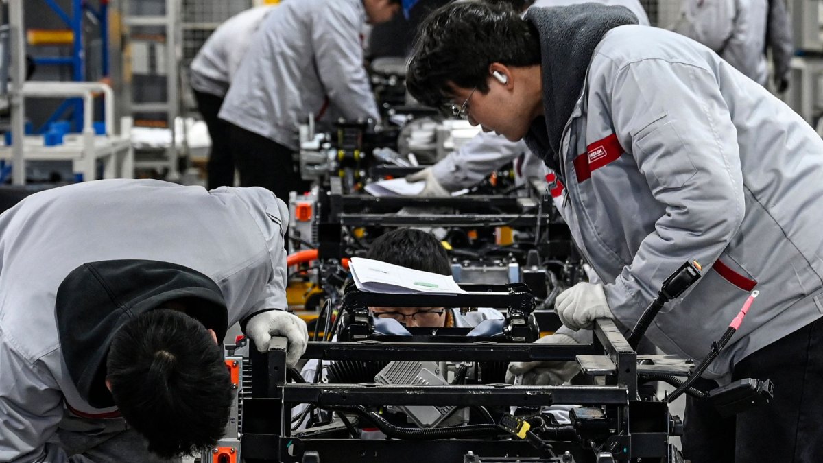 China's factory activity expands as orders pick up ahead of holidays