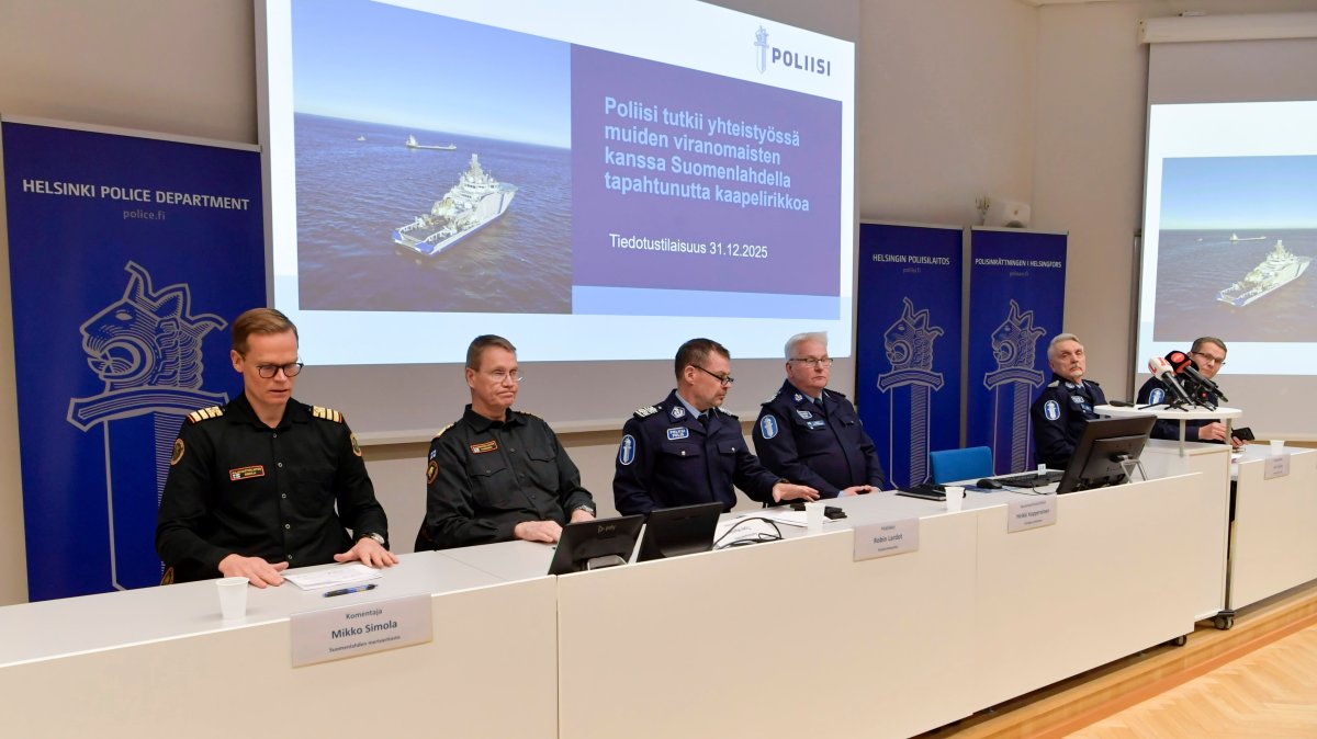 From left, Gulf of Finland Coast Guard District Commander Mikko Simola, Chief of the Border Guard Markku Hassinen, Director of the National Bureau of Investigation Robin Lardot, Helsinki Deputy Police Commissioner Heikki Kopperoinen, Helsinki Police Department chief Jari Liukku and National Police Commissioner Ilkka Koskimaeki, attend a news conference in Helsinki, Finland, Dec. 31, 2025. (Kimmo Penttinen/Lehtikuva via AP)