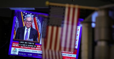 A screen broadcasts a news conference by U.S. Federal Reserve Chair Jerome Powell following the Fed rate announcement, on the floor of the New York Stock Exchange (NYSE) in New York City, U.S., Dec. 10, 2025. (Reuters Photo)