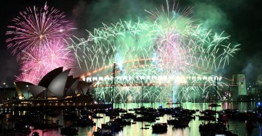 Fireworks light up the midnight sky over Sydney Harbour Bridge and Sydney Opera House during New Year’s Day celebrations in Sydney, Australia, Jan. 1, 2026. (AFP Photo)