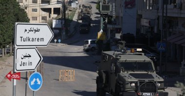  Israeli troops block a street after demolishing the house of Palestinian prisoner Abdul Karim Sanoubar in the West Bank city of Nablus, Dec. 2, 2025. (EPA Photo)