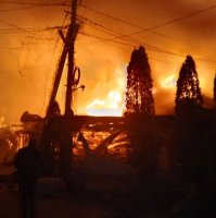 Flames and smoke rise from a fire following what Russian-installed authorities described as an overnight Ukrainian drone strike on a hotel and cafe, amid the ongoing Russia-Ukraine conflict in the village of Khorly, in the Kherson Region, a Russian-controlled area of Ukraine, Jan. 1, 2026. (Reuters Photo)