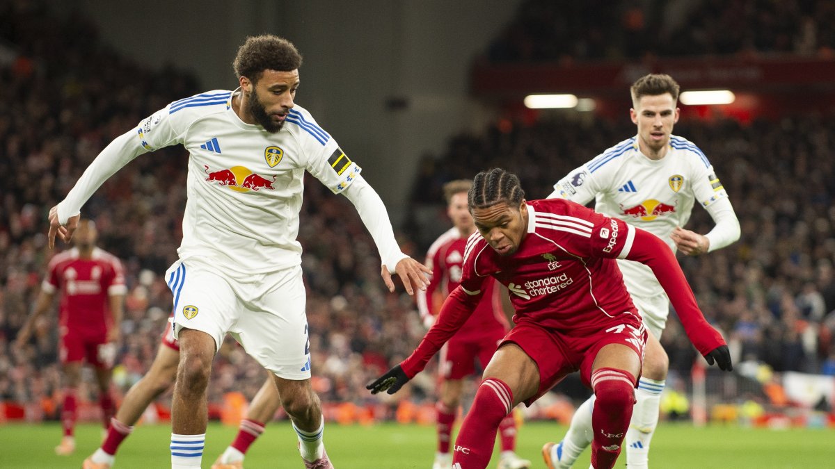 Liverpool's Rio Ngumoha (2nd R) in action with James Justin of Leeds United during the English Premier League match between Liverpool FC and Leeds United, Liverpool, U.K., Jan. 1, 2026. (EPA Photo)