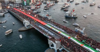 A drone view shows people gathering over the Galata Bridge in solidarity with Palestinians on New Year's Day in Istanbul, Türkiye, January 1, 2026. (Reuters Photo) 