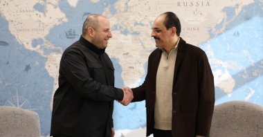 Türkiye’s intelligence chief Ibrahim Kalın (L) and Ukraine’s National Security and Defense Council Secretary Rustem Umerov shake hands in Ankara, Türkiye, Jan. 1, 2026.