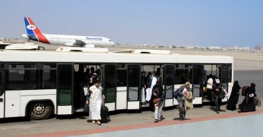 Passengers step out of a bus at Aden Airport in Aden, Yemen, Jan. 1, 2026. (Reuters Photo)