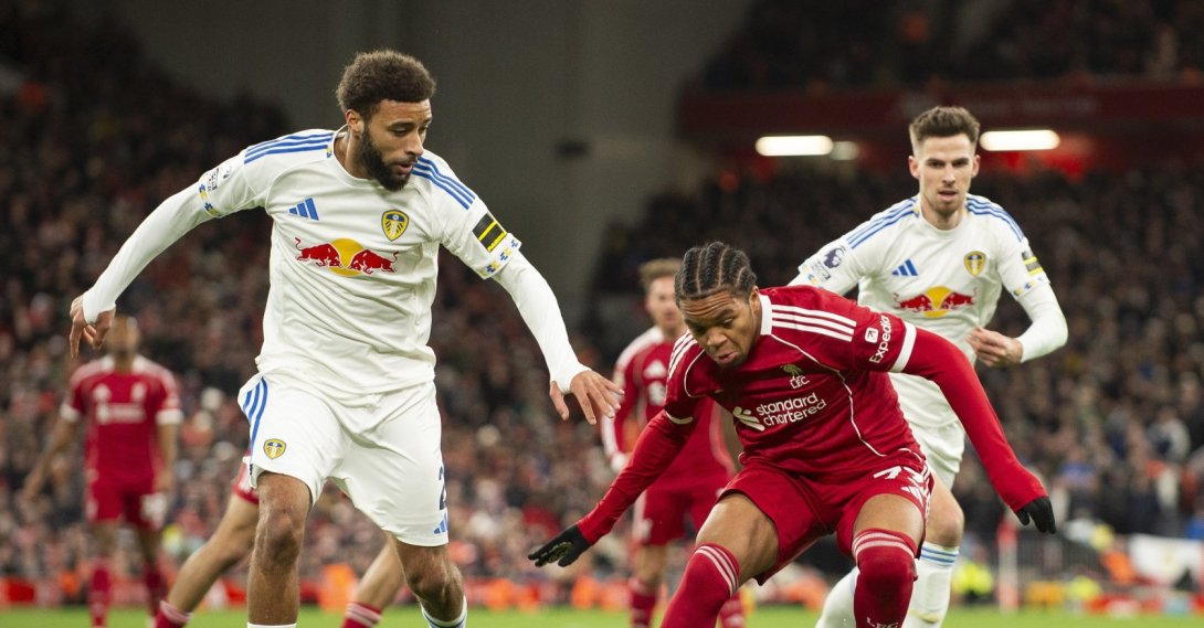 Liverpool's Rio Ngumoha (2nd R) in action with James Justin of Leeds United during the English Premier League match between Liverpool FC and Leeds United, Liverpool, U.K., Jan. 1, 2026. (EPA Photo)