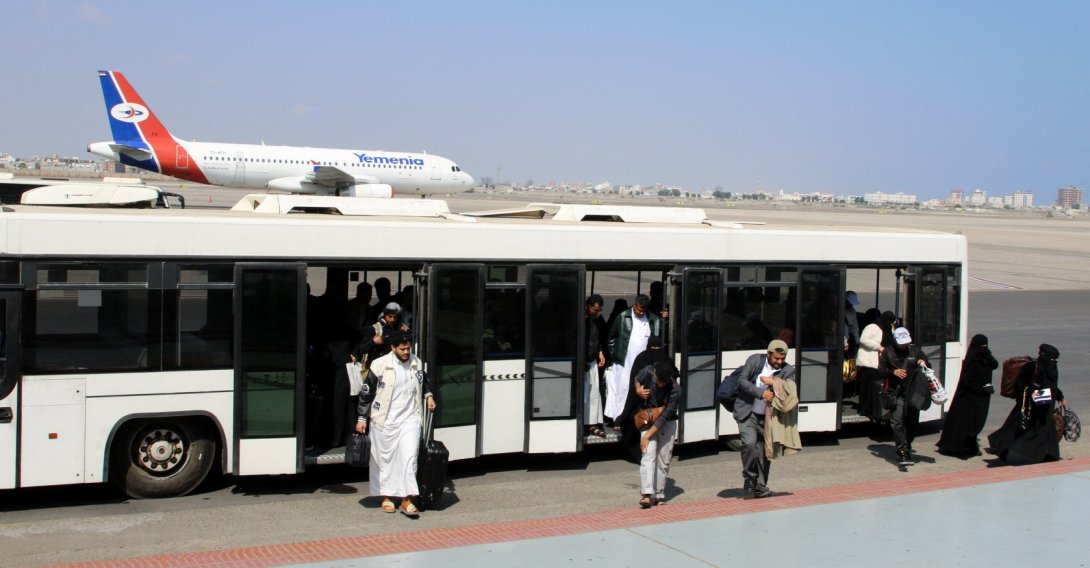 Passengers step out of a bus at Aden Airport in Aden, Yemen, Jan. 1, 2026. (Reuters Photo)