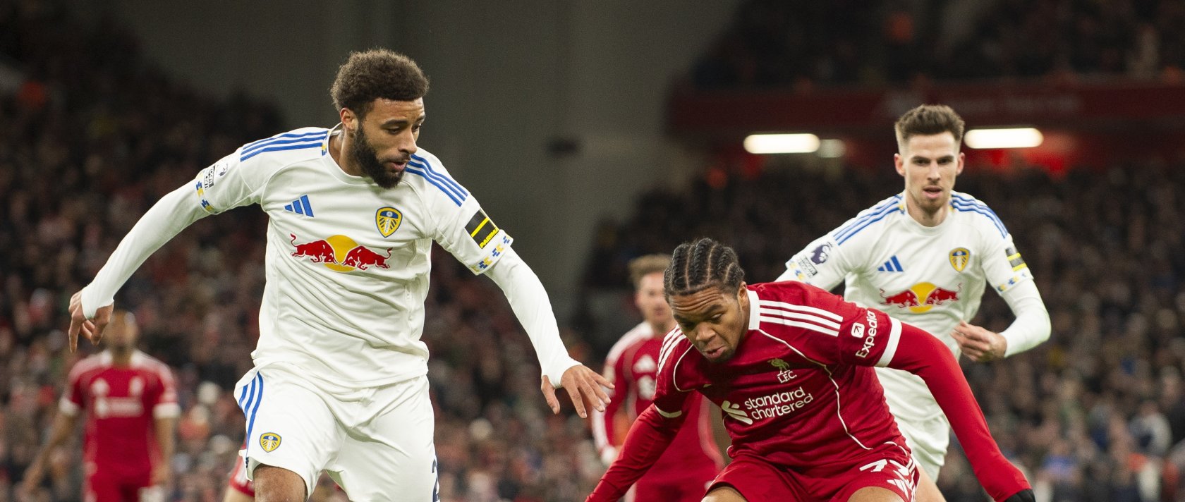 Liverpool's Rio Ngumoha (2nd R) in action with James Justin of Leeds United during the English Premier League match between Liverpool FC and Leeds United, Liverpool, U.K., Jan. 1, 2026. (EPA Photo)