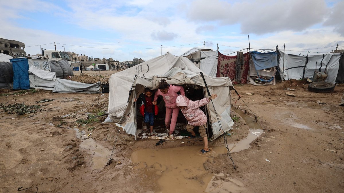 Gaza children die in floods as fragile cease-fire holds partially