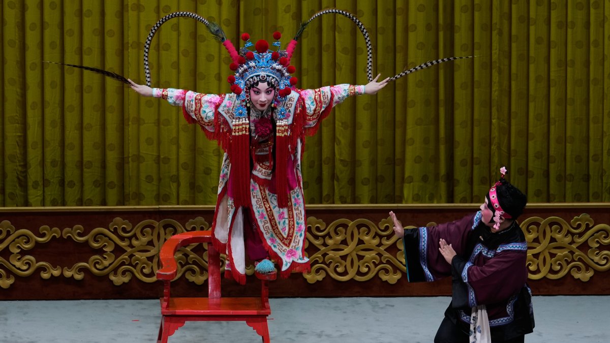 Peking Opera actress Zhang Wanting performs during a show at Jixiang Theatre in Beijing, China, Sept. 7, 2025. (AP Photo)
