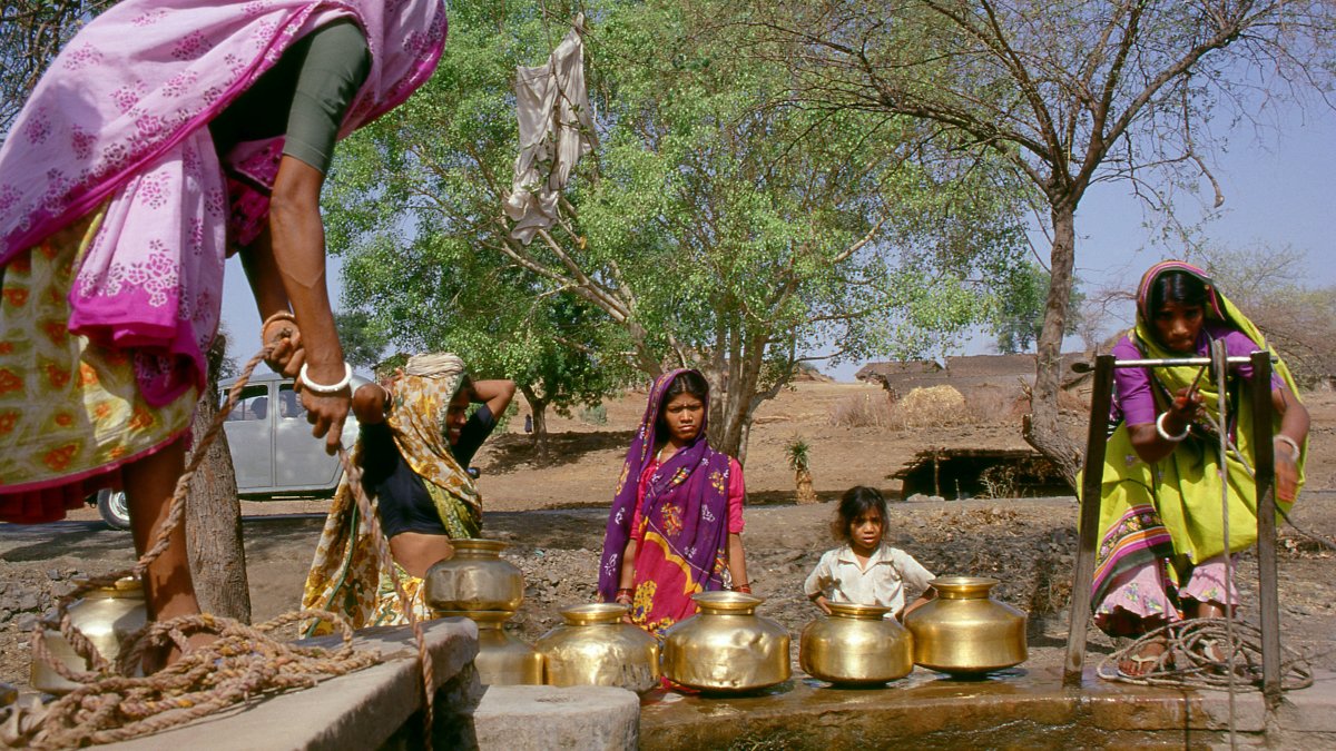 This undated photo shows Indian women fetching water at a village well near Indore, Madhya Pradesh. (Getty Images Photo)