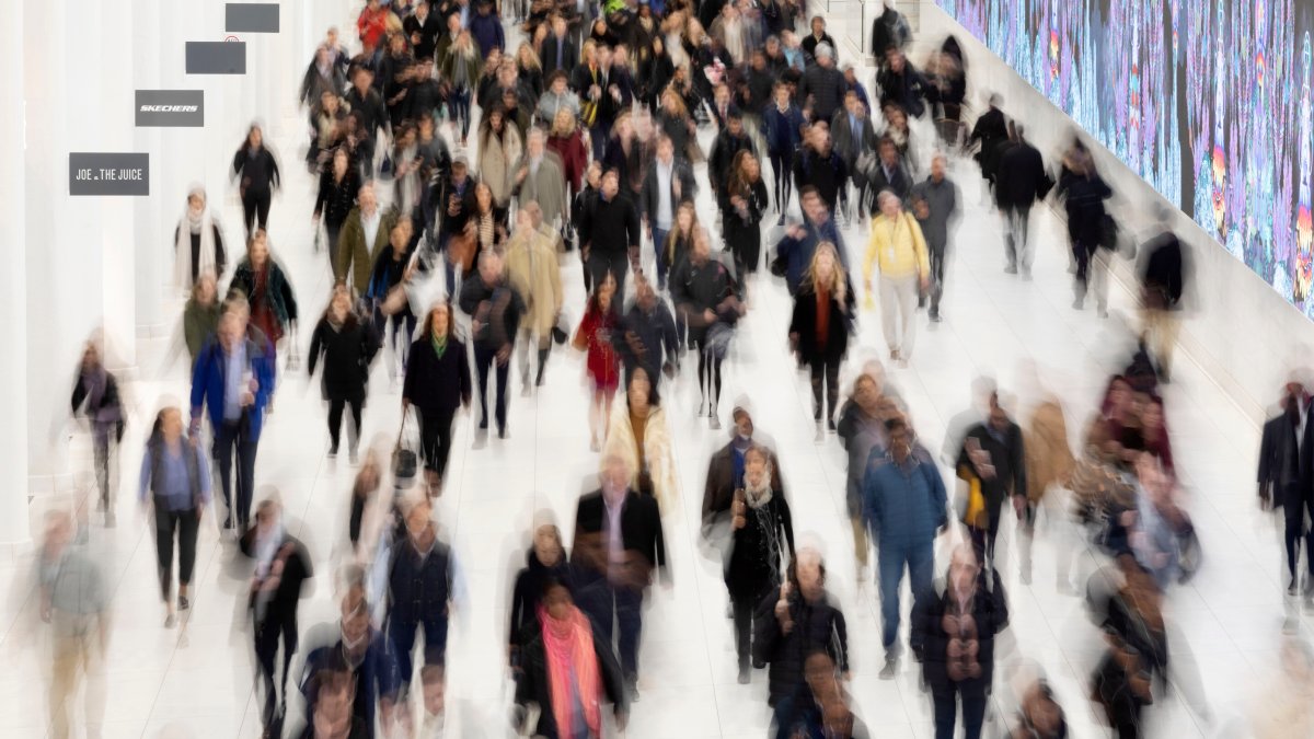 Commuters walk along a corridor in the World Trade Center, New York, U.S., Nov. 18, 2019. (AP Photo)
