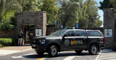 A Federal Police truck remains outside the Argentine Football Association (AFA) training facility during a police raid in Ezeiza, Buenos Aires Province, Argentina, Dec. 30, 2025. (AFP Photo)