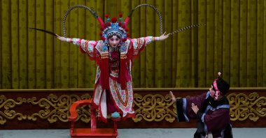 Peking Opera actress Zhang Wanting performs during a show at Jixiang Theatre in Beijing, China, Sept. 7, 2025. (AP Photo)