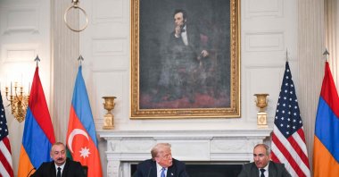 U.S. President Donald Trump participates in a trilateral signing with Azerbaijani President Ilham Aliyev (L) and Armenian Prime Minister Nikol Pashinyan (R) in the State Dining Room of the White House, Washington, U.S., Aug. 8, 2025. (AFP Photo)