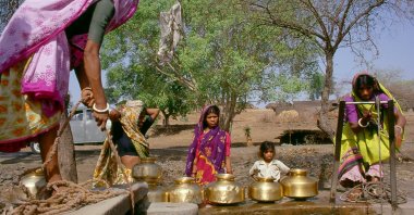 This undated photo shows Indian women fetching water at a village well near Indore, Madhya Pradesh. (Getty Images Photo)