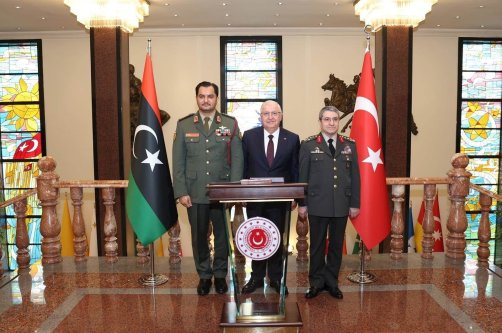 Defense Minister Yaşar Güler (C) meets with Libyan National Army Chief of Land Forces Saddam Haftar (L), Ankara, Türkiye, April 4, 2025. (Photo Courtesy of Turkish Defense Ministry)