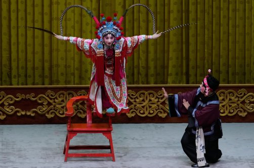 Peking Opera actress Zhang Wanting performs during a show at Jixiang Theatre in Beijing, China, Sept. 7, 2025. (AP Photo)