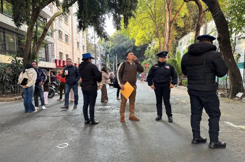 People wait outside their homes and buildings after an earthquake in Mexico City, Mexico, Jan. 2, 2026. (Reuters Photo)