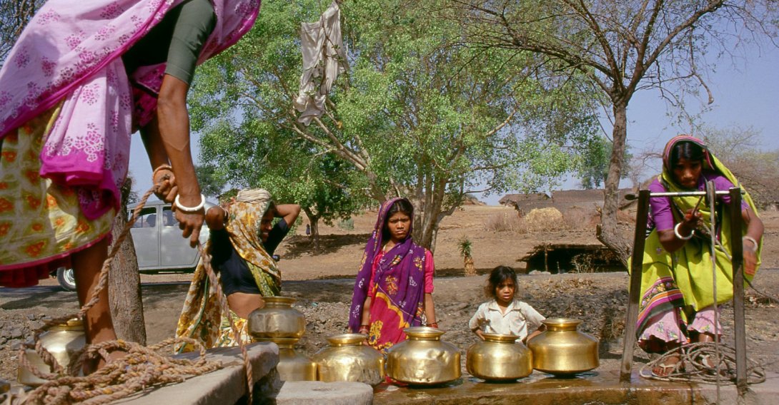 This undated photo shows Indian women fetching water at a village well near Indore, Madhya Pradesh. (Getty Images Photo)
