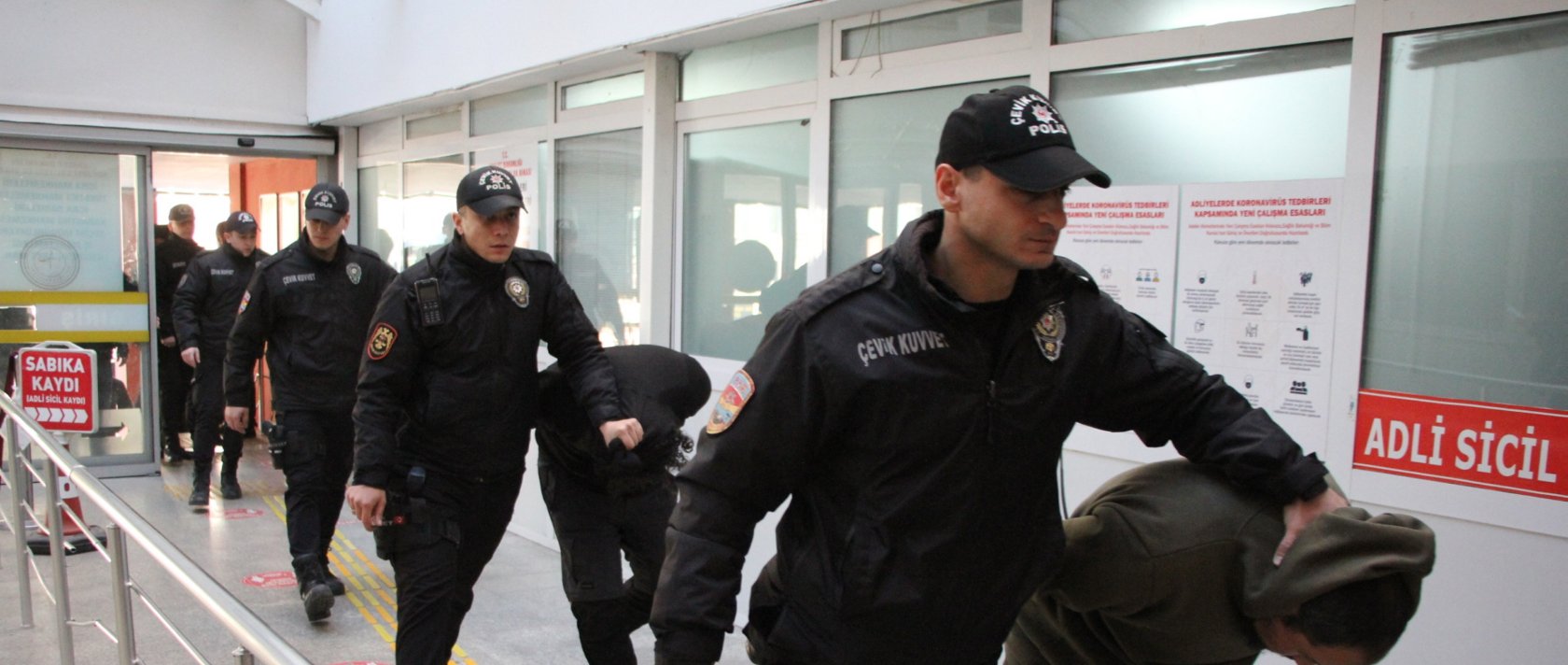 Police officers escort suspects detained as part of counterterrorism operations in Kocaeli, Jan. 2, 2025. (AA Photo)