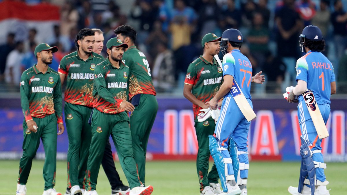 Indian players Shubman Gill and KL Rahul shake hands with Bangladesh players  after an ICC Men's Champions Trophy match in Dubai, U.A.E., Feb. 20, 2025. (Reuters Photo)