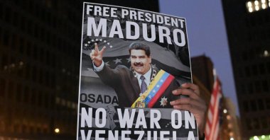 Protesters gathered at Dirksen Federal Building Plaza as part of an emergency antiwar demonstration against U.S. airstrikes on Caracas and the capture of Venezuelan President Nicolas Maduro, Chicago, Illinois, U.S., Jan. 3, 2025. (AA Photo)