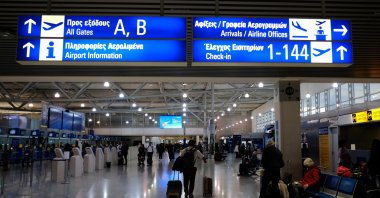 Passengers are in the hall of departures of the Athens international airport in Athens, Greece, April 9, 2019. (Shutterstock Photo)