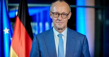 German Chancellor Friedrich Merz poses for pictures during the recording of his new year's speech in Berlin, Germany, Dec. 19, 2025. (AFP Photo)