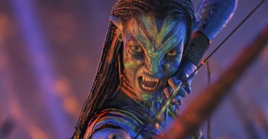 This image released by Disney shows Neytiri, played by Zoe Saldana, in a scene from "Avatar: Fire and Ash." (AP Photo)