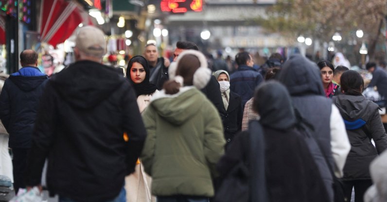 People walk on a street amid protests over the collapse of the currency's value in Tehran, Iran, Jan. 2, 2026. (Reuters Photo)