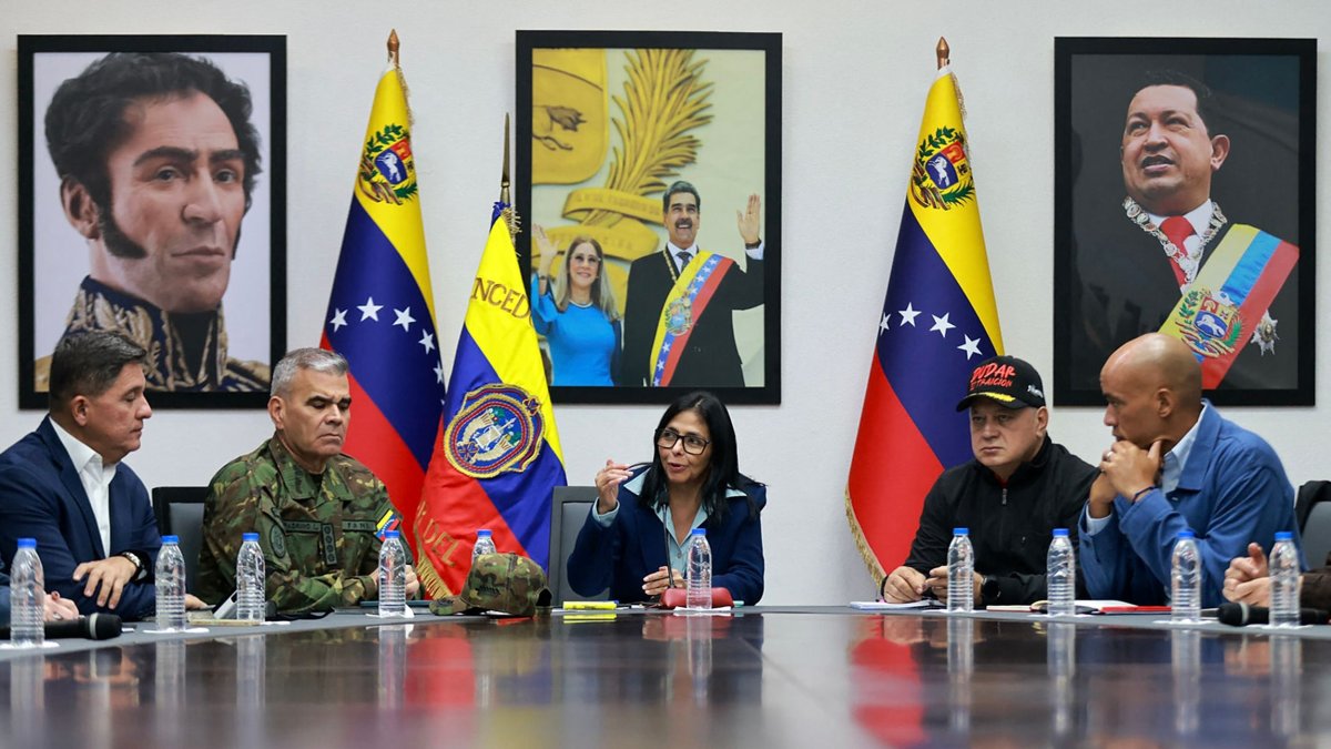 Venezuela’s interim leader seeks cooperation with Trump amid standoff