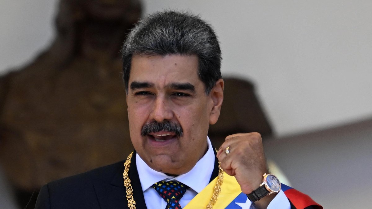 Former Venezuelan President Nicolas Maduro gestures as he leaves the Capitolio - home of the National Assembly - after taking the oath during the presidential inauguration, Caracas, Venezuela, Jan. 10, 2025. (AFP Photo)