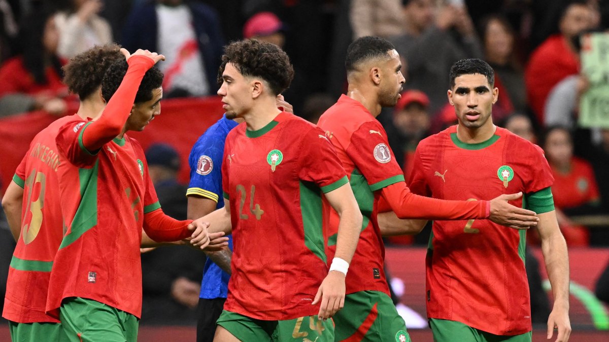 Morocco's Achraf Hakimi (R) celebrates with teammates after the Africa Cup of Nations (AFCON) round of 16 football match between Morocco and Tanzania at Prince Moulay Abdallah Stadium, Rabat, Morocco, Jan. 4, 2026. (AFP Photo)
